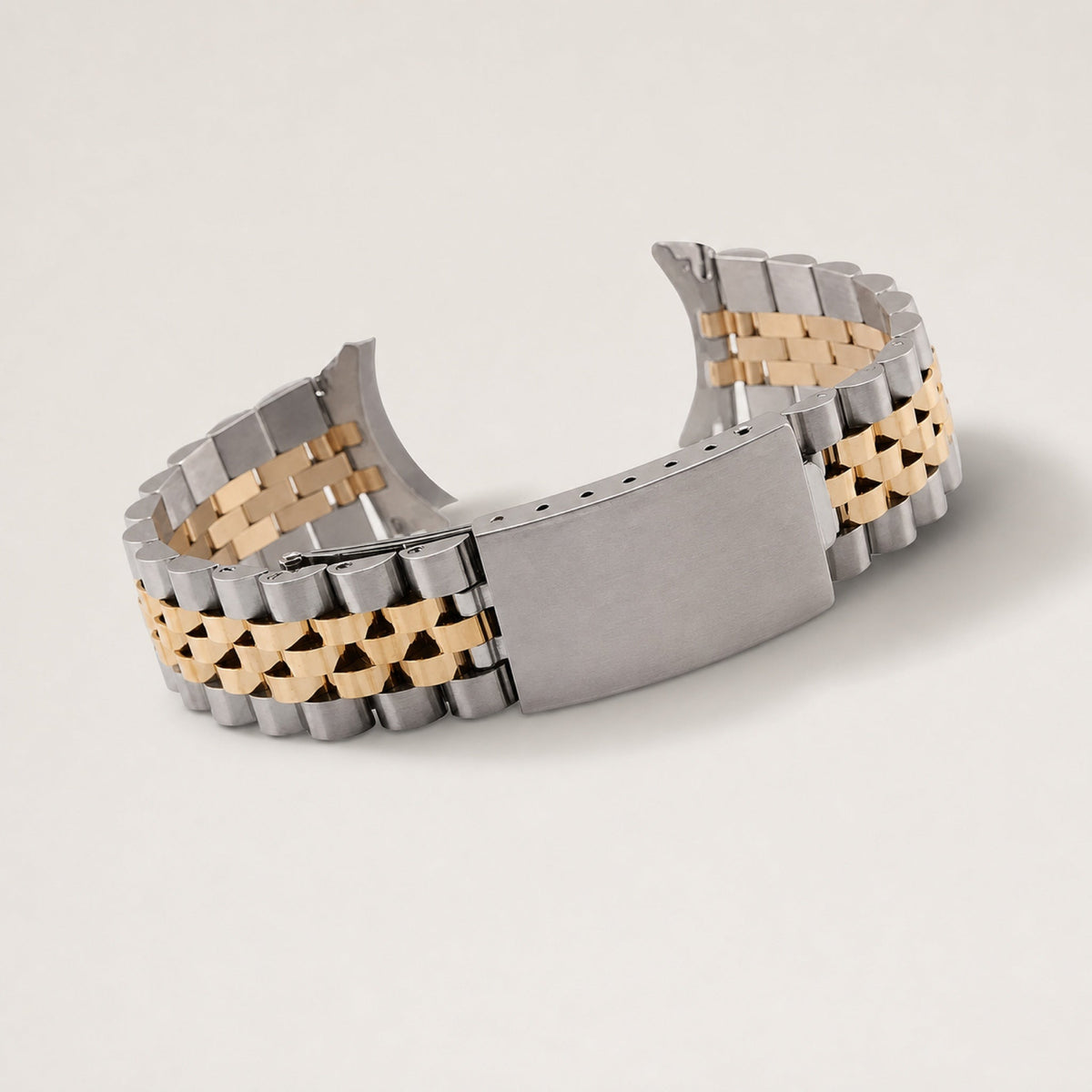 Bracelet cinq rangs à embouts courbes — acier et or, fermoir vierge — Maison Noirmont