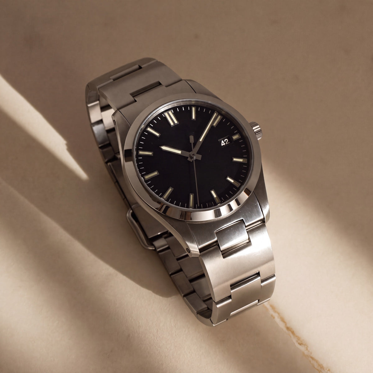 Quarante-et-Un — cadran noir, bracelet acier — Maison Noirmont