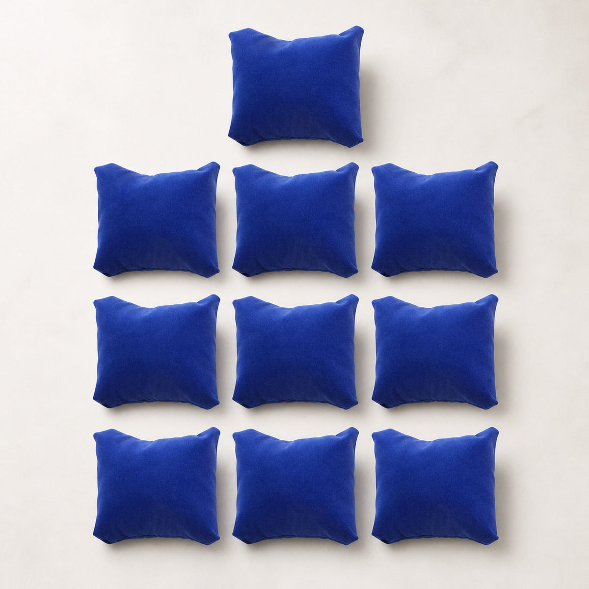Lot de dix coussins de présentation — bleu royal — Maison Noirmont