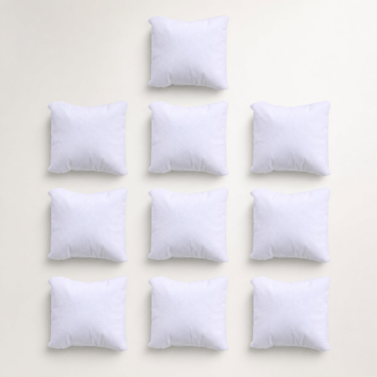Lot de dix coussins de présentation — blanc — Maison Noirmont