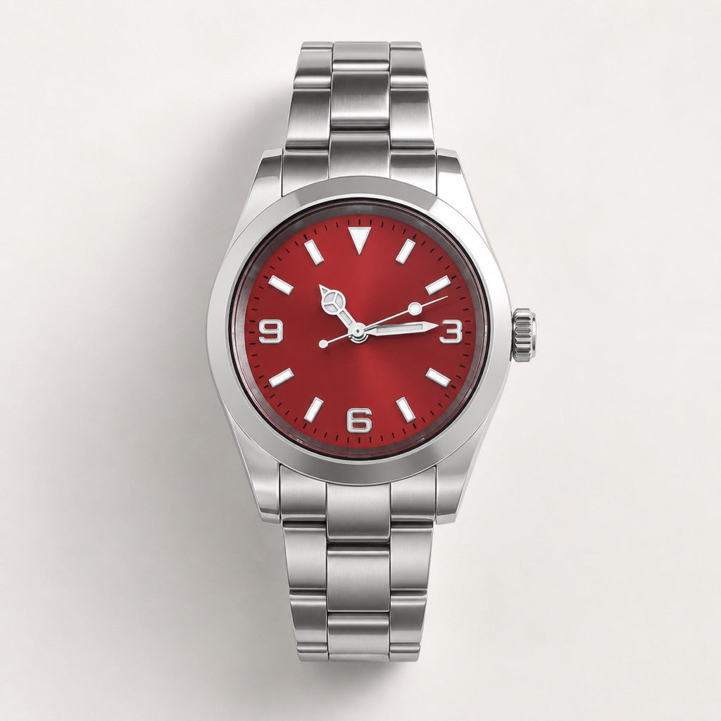 Montre Repère à cadran rouge, chiffres 3-6-9 et bracelet acier — Maison Noirmont